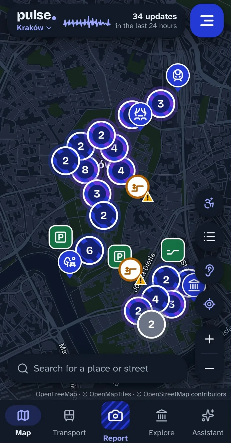 Mapa Krakowa w aplikacji Pulse ze zgrupowanymi zgłoszeniami barier i udogodnień